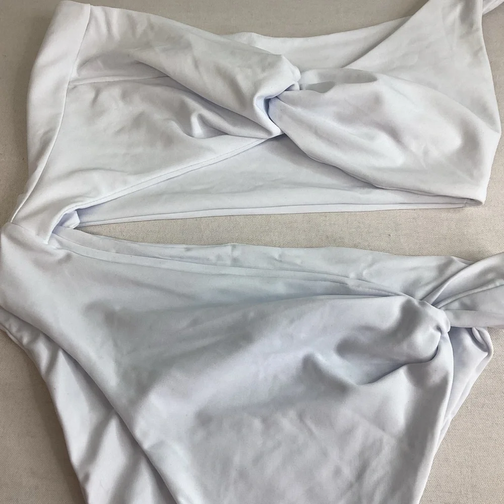 White one piece swimsuit. - Picture 2 of 8